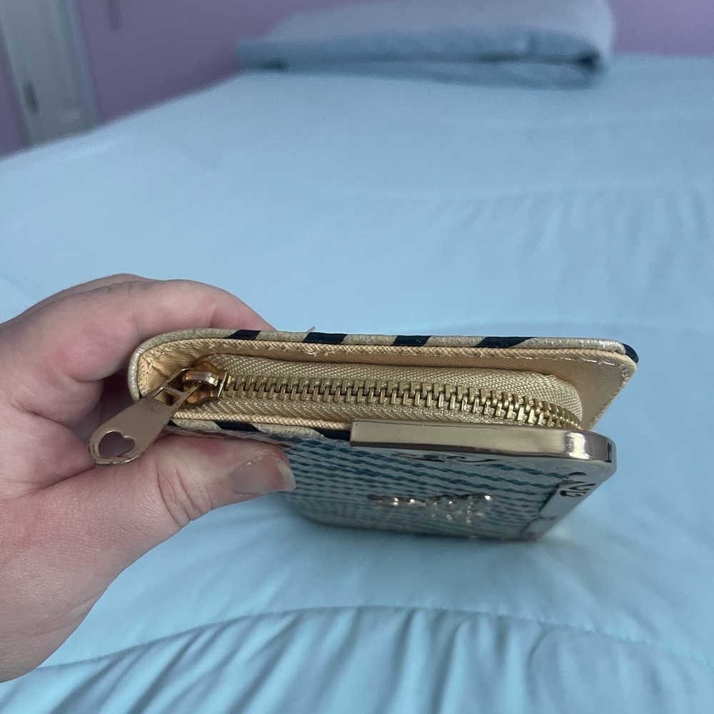 Animal print with butterfly metal details wallet. 8”x 4”x 1” - Picture 3 of 10